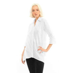 Model wears white Mason blouse with a black legging.