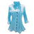 Tunic shaped blouse with three quarter sleeves, point collar in color ice, which can be describes as a light reflecting blue. Buttons and seems are black.